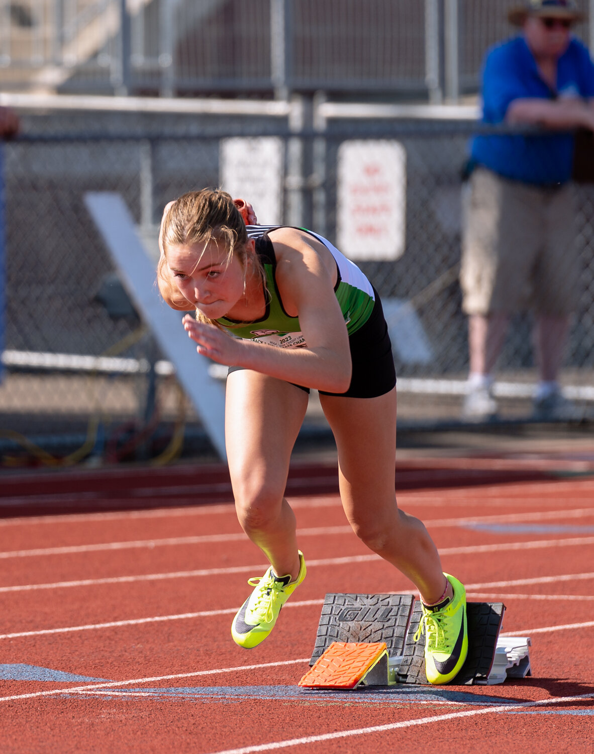 Tumwater’s Cassidy Hedin takes off from the blocks to start the 4x200 preliminary relay at the WIAA 2A/3A/4A State Track and Field Championships on Thursday, May 25, 2023, at Mount Tahoma High School in Tacoma. (Joshua Hart/For The Chronicle)